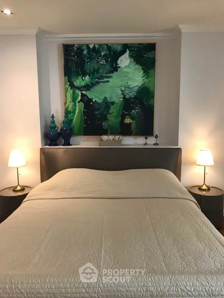 Elegant bedroom with stylish decor and ambient lighting