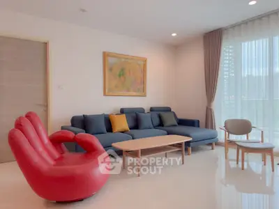 Modern living room with stylish furniture and vibrant decor