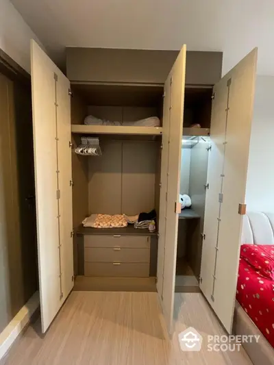 Spacious modern wardrobe with ample storage in a stylish bedroom