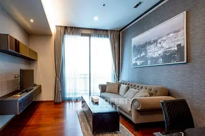 Modern living room with elegant decor and large window