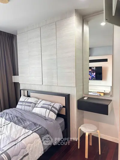Modern bedroom with stylish decor and built-in storage solutions