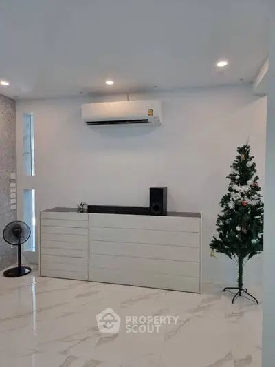 Modern living room with air conditioning and minimalist decor