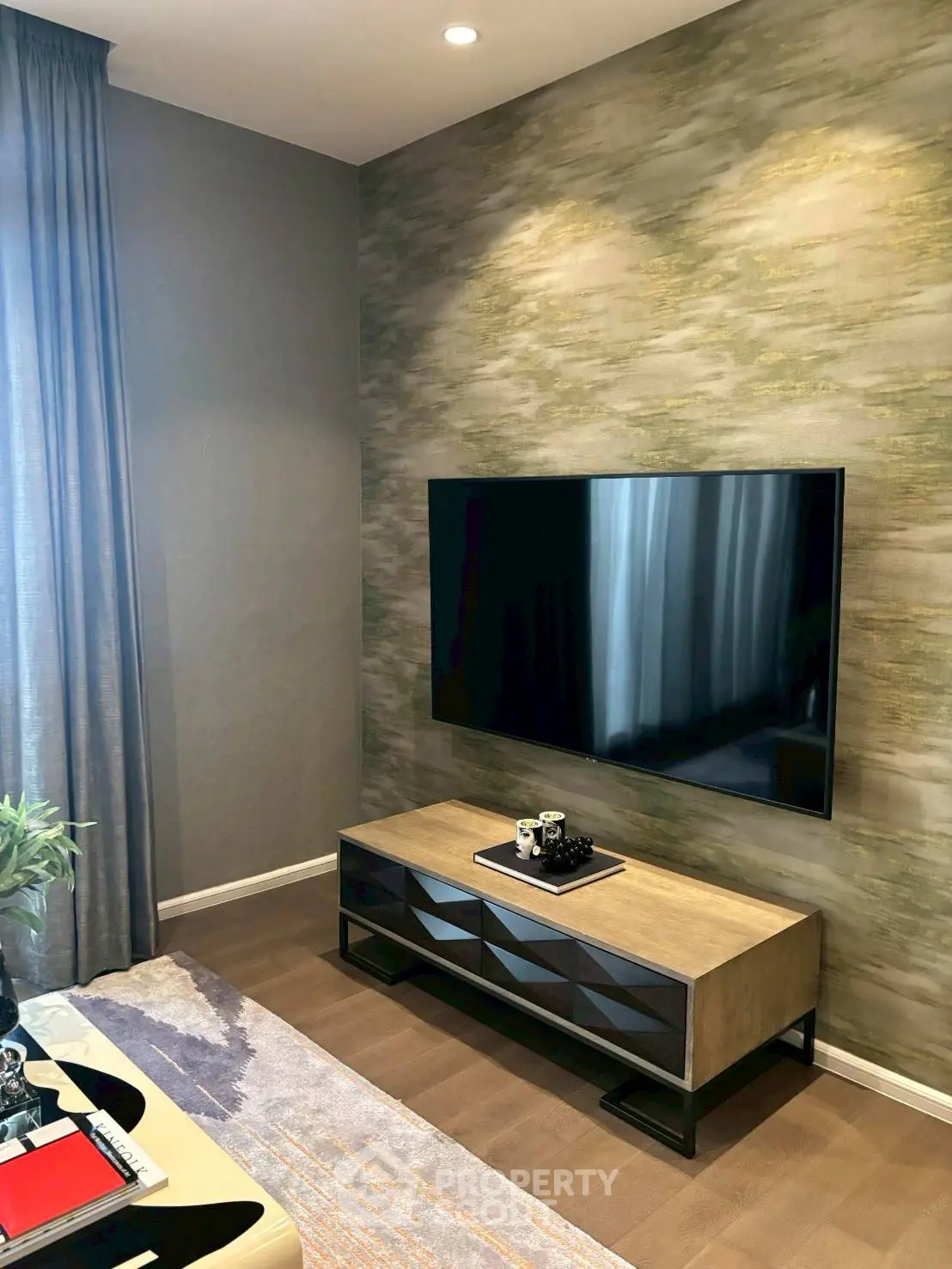 Modern living room with stylish TV setup and elegant decor