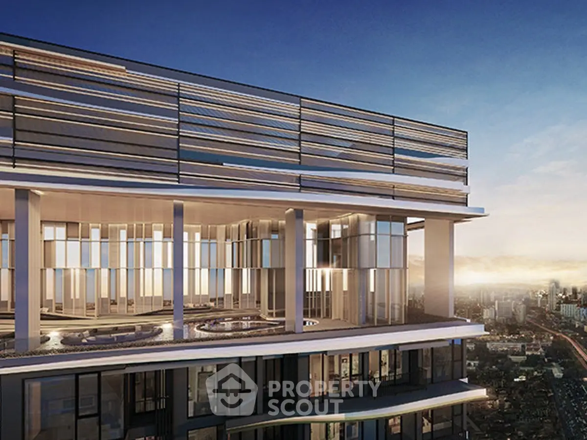 Stunning modern high-rise building with panoramic city views at sunset.