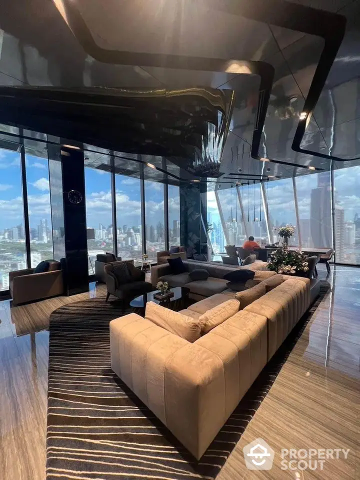 Luxurious high-rise living room with panoramic city views and modern decor