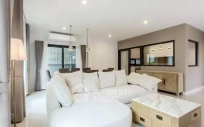 Spacious modern living room with elegant decor and natural light