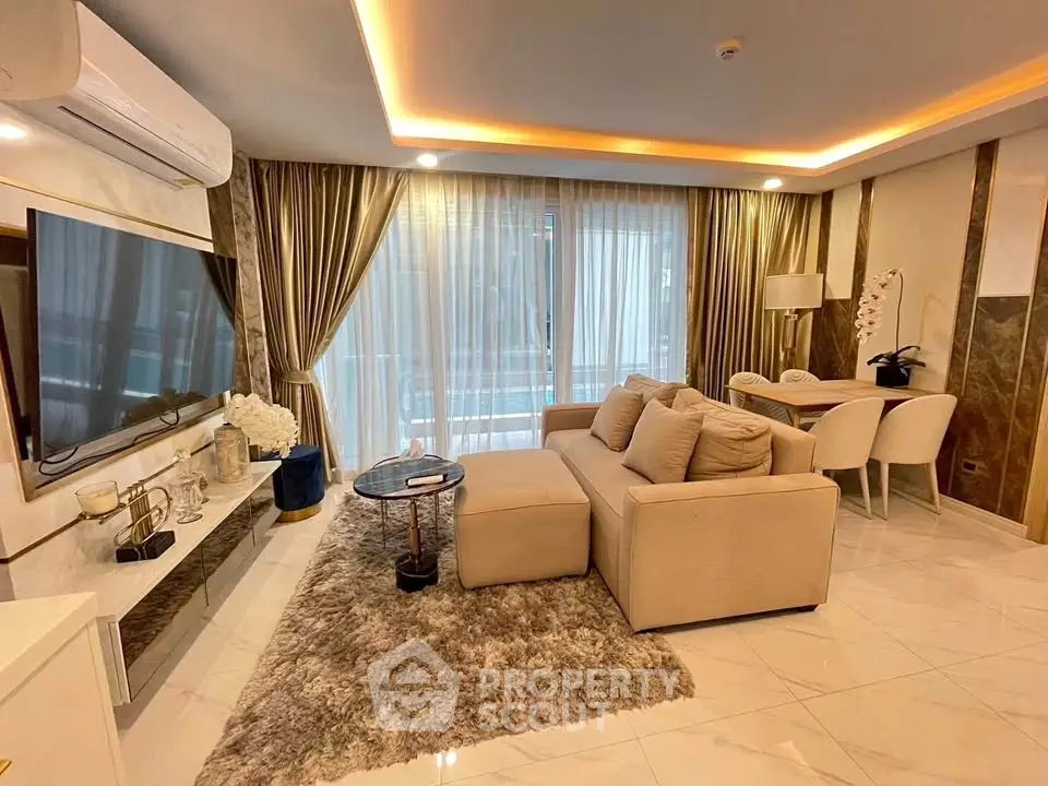 Luxurious modern living room with elegant decor and large windows