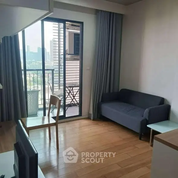 Modern living room with balcony view in urban apartment