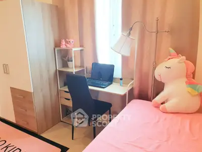 Charming kids bedroom with study desk and unicorn plush toy