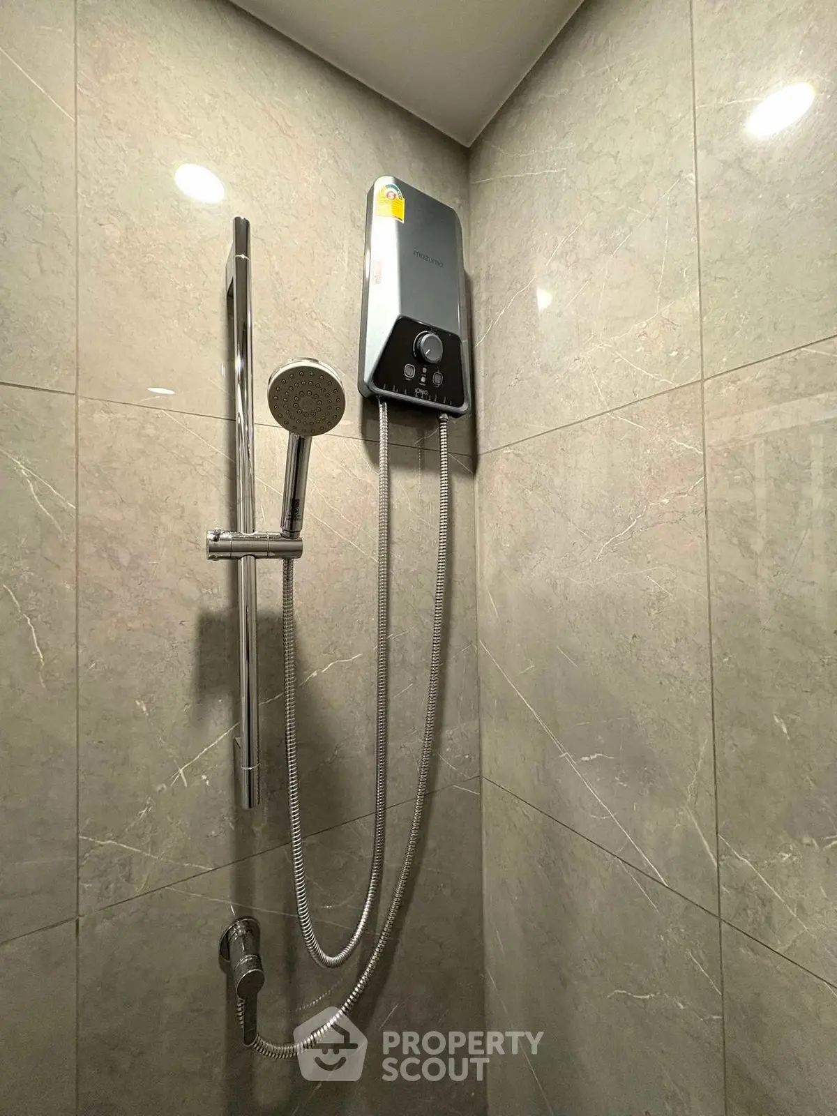 Modern bathroom shower with sleek design and water heater