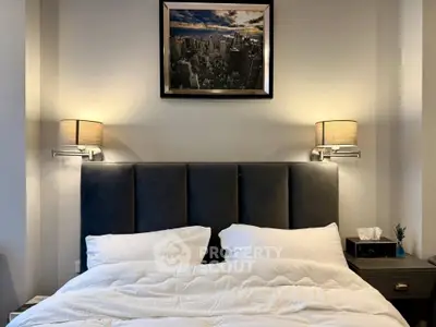 Luxurious bedroom with elegant decor and plush bedding, perfect for relaxation and comfort.