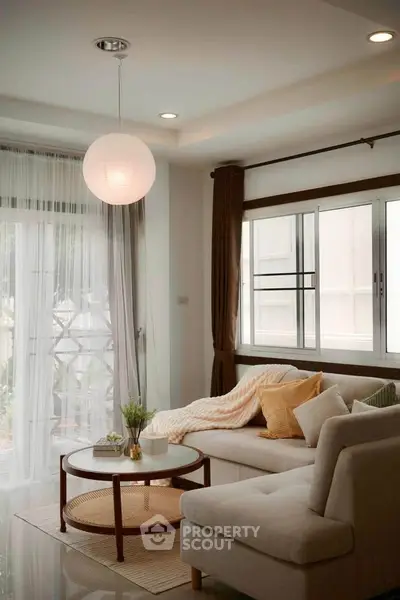 Cozy living room with modern decor and natural light