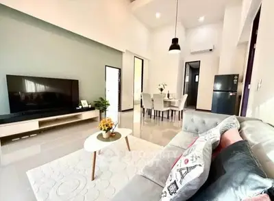 Spacious modern living room with stylish decor and dining area