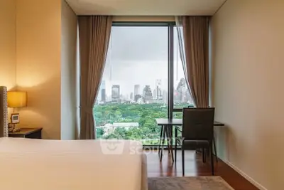 Luxurious bedroom with stunning city view through large window, elegant decor and cozy ambiance.