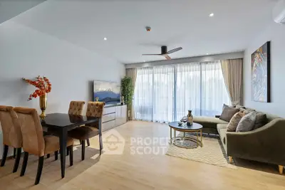 Spacious modern living room with elegant decor and ample natural light