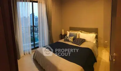 Cozy bedroom with city view and elegant decor in modern apartment