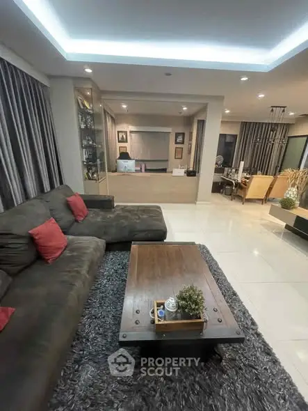 Spacious modern living room with plush sofa and stylish decor