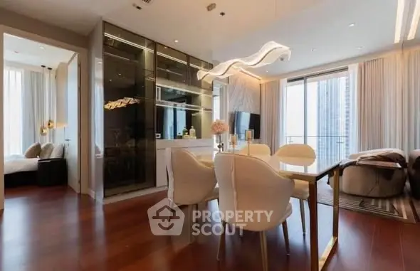 Luxurious modern living room with elegant dining area and stunning city view from balcony.