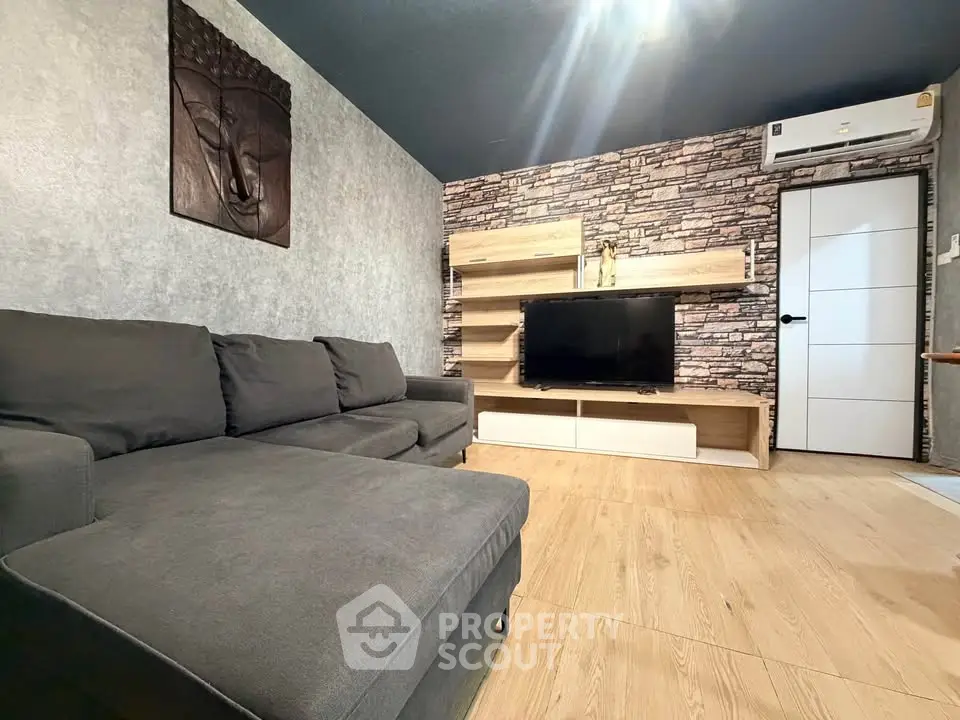 Modern living room with stylish decor and cozy sectional sofa