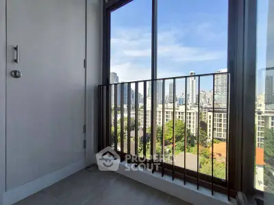 Stunning urban view from a high-rise balcony with city skyline