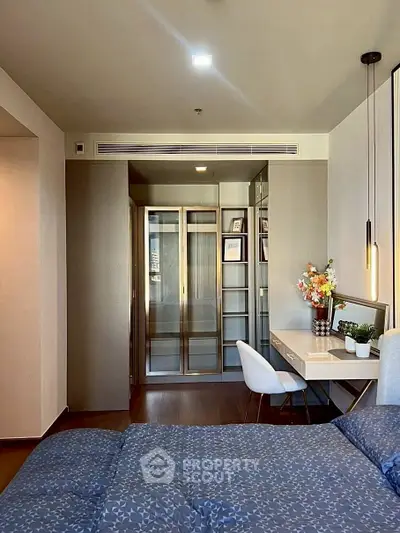 Modern bedroom with stylish study area and elegant decor