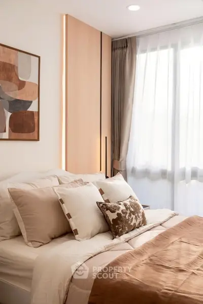 Cozy bedroom with modern decor and natural light