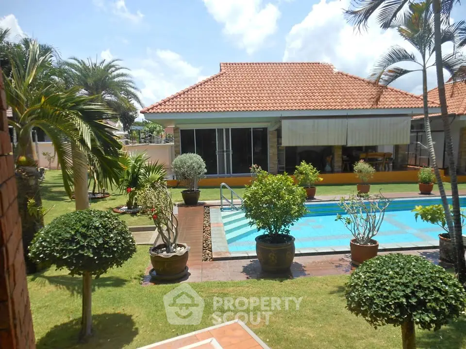Luxurious villa with private pool and lush garden, perfect for relaxation and entertainment.