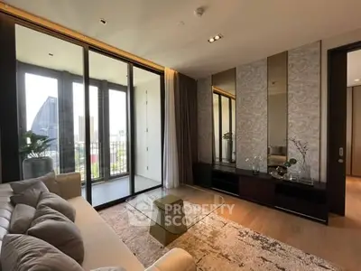 Luxurious living room with modern decor and stunning city view from balcony.