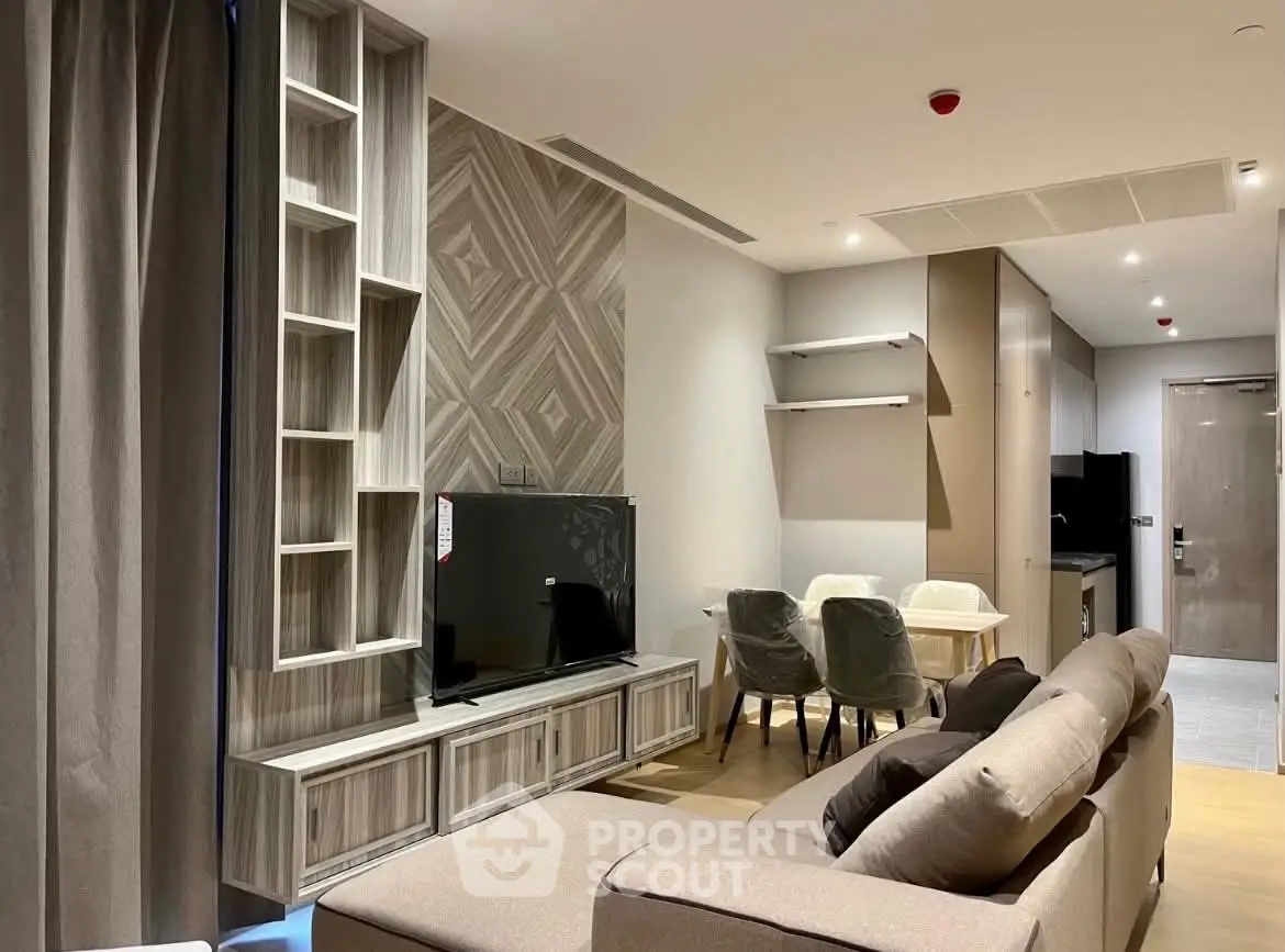 Modern living room with stylish decor and open layout in a contemporary apartment.