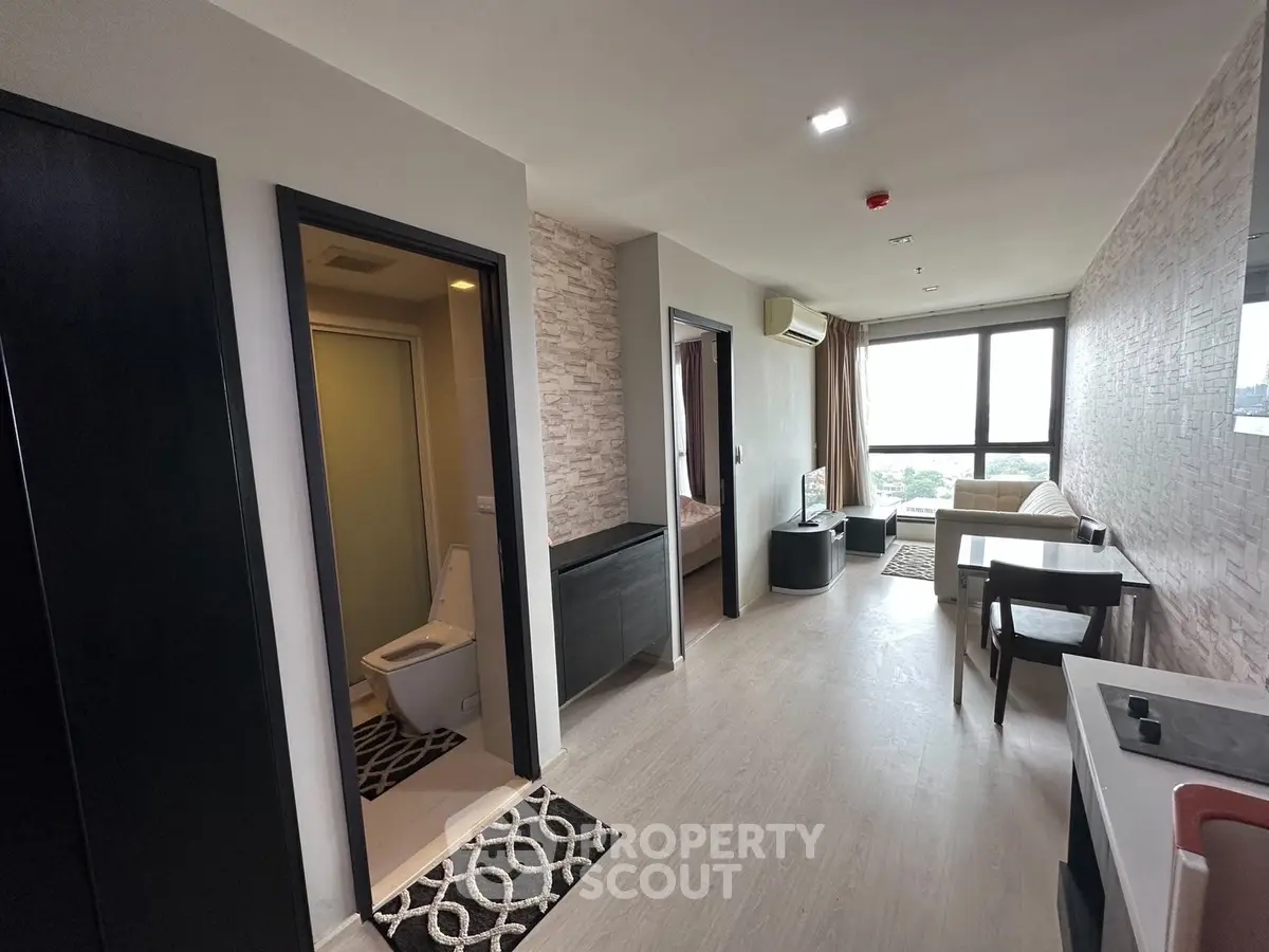 Modern apartment interior with open layout and city view