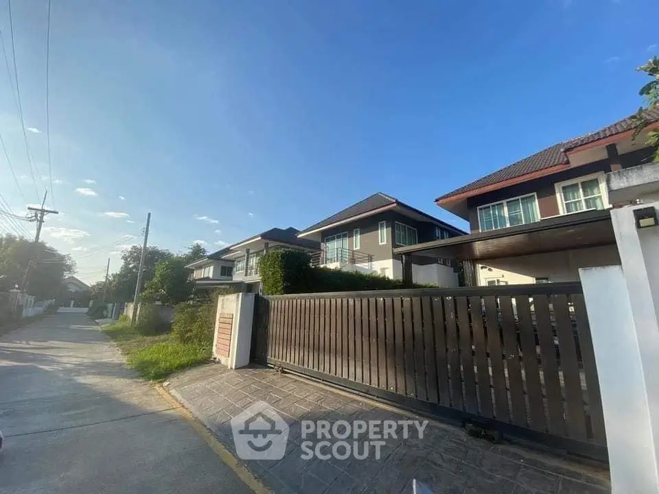 Charming suburban house with modern design and spacious driveway in a serene neighborhood.