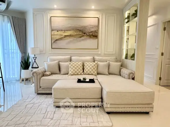 Luxurious living room with elegant beige sectional sofa and modern decor