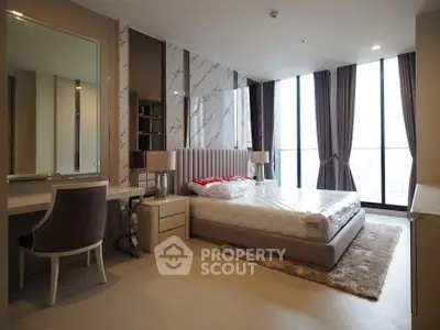 Luxurious bedroom with modern decor and large windows offering stunning views.