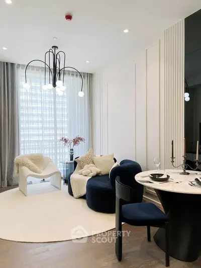 Elegant modern living room with stylish furniture and chic lighting