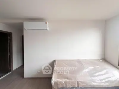 Modern bedroom with air conditioning and minimalist design