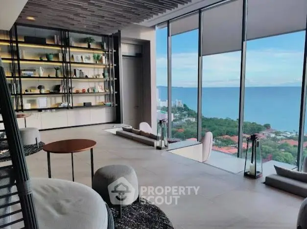 Luxurious living room with panoramic ocean view and modern decor