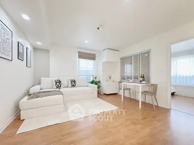 Spacious modern living room with elegant decor and natural light