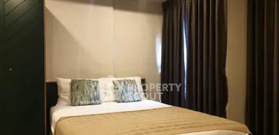 Cozy bedroom with elegant decor and soft lighting, perfect for relaxation.