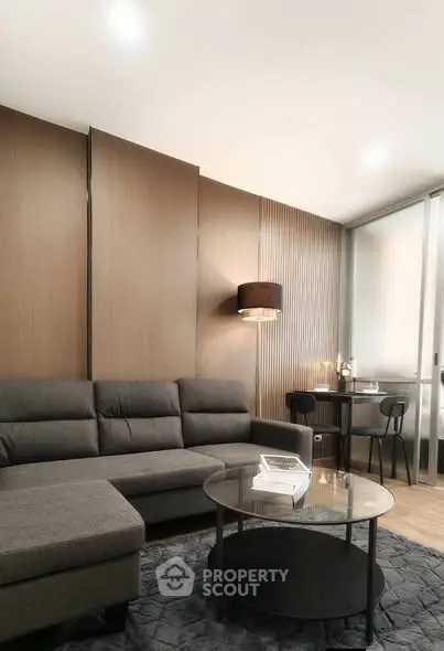 Modern living room with stylish furniture and elegant lighting