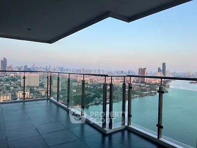 Stunning high-rise balcony with panoramic city and river views
