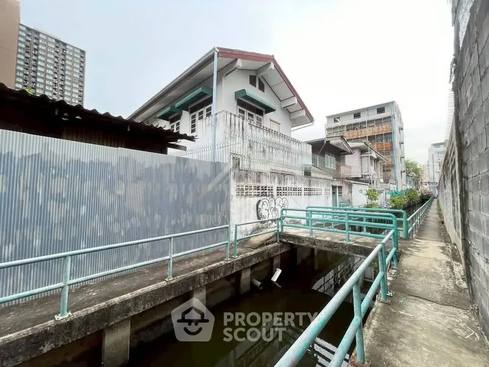Charming urban residential area with unique architectural style and canal view.