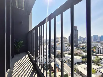 Stunning city view from a modern high-rise balcony, perfect for urban living.
