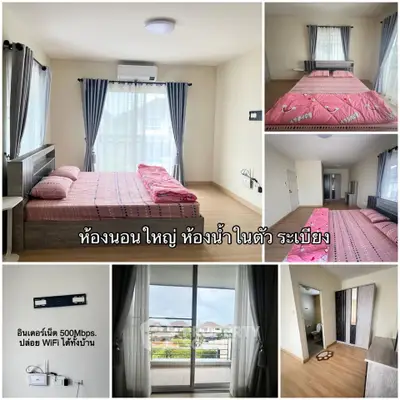 Spacious bedroom with ensuite and balcony, modern decor, ample natural light.