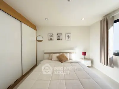 Bright and cozy bedroom with modern decor and ample natural light