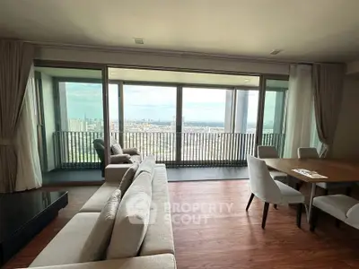Spacious living room with panoramic city view and elegant furnishings