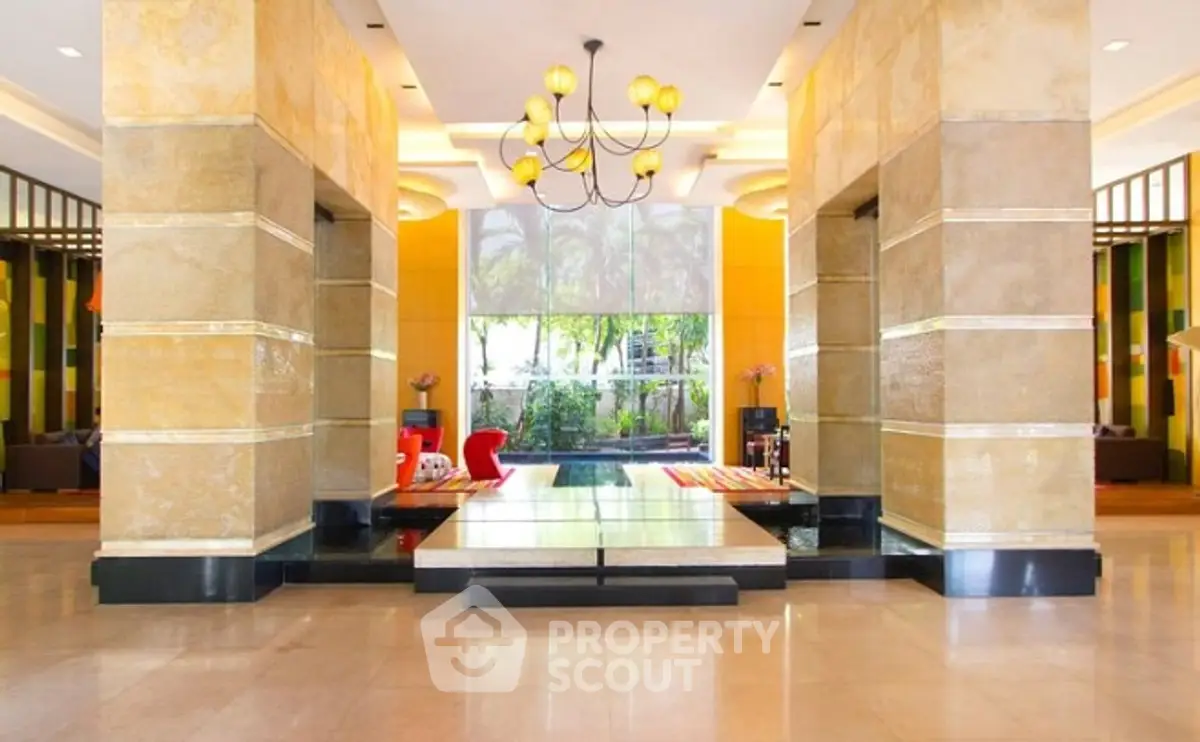 Luxurious hotel lobby with elegant chandelier and modern design