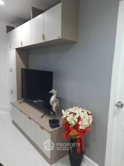 Modern living room with sleek TV stand and elegant decor