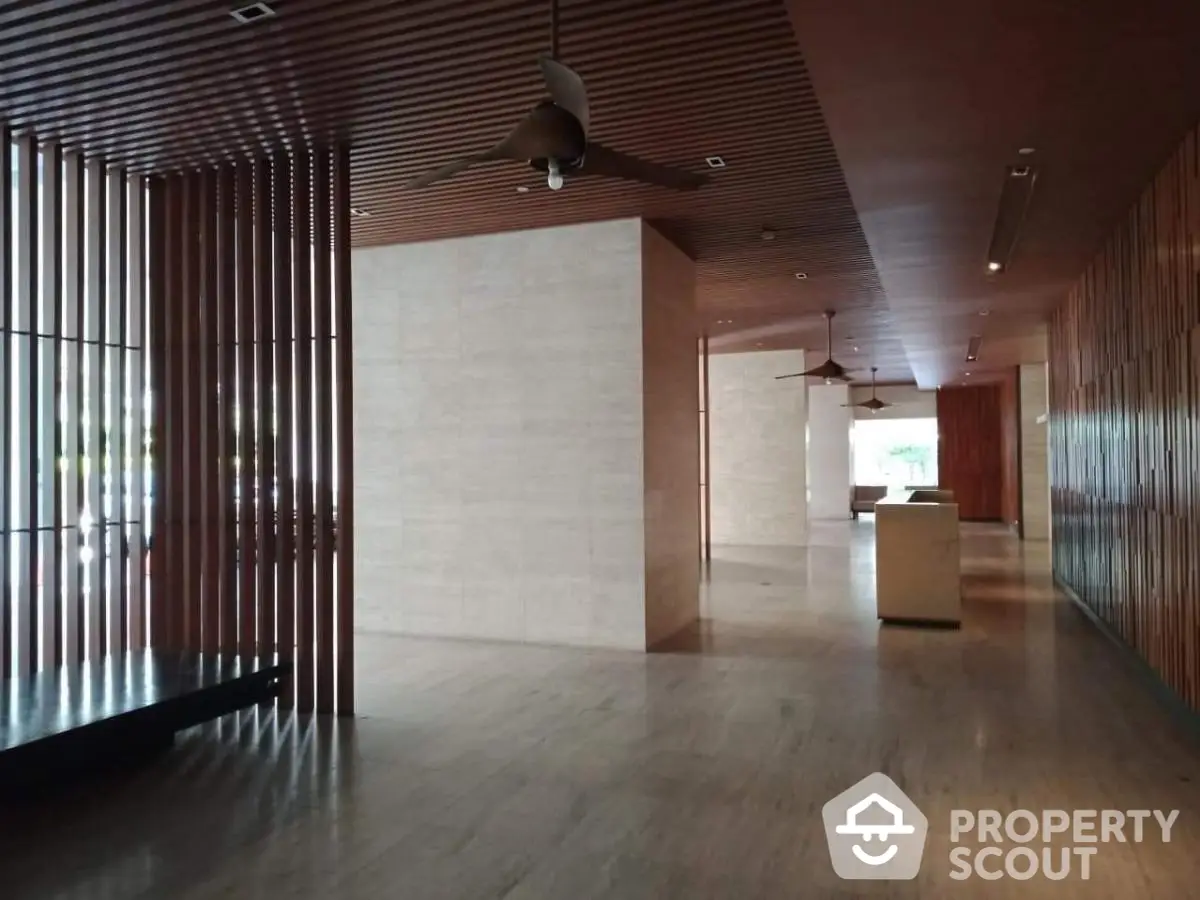 Elegant modern lobby with wooden accents and natural light