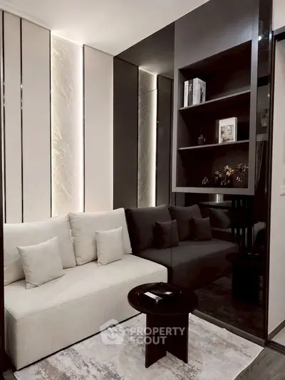 Modern living room with sleek design, featuring a cozy sofa, stylish shelving, and ambient lighting.