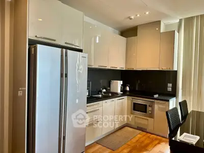 Modern kitchen with sleek cabinetry and stainless steel appliances